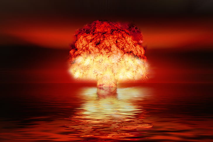 bomb explosion on body of water at night