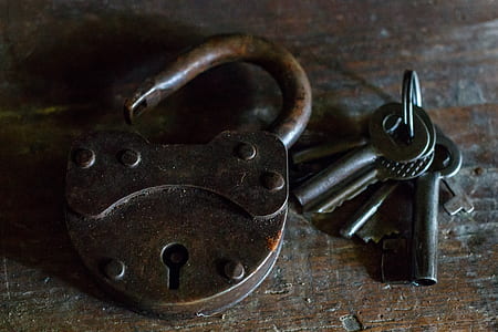 brass padlock and keys