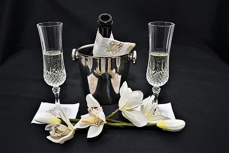 white flowers and clear wine glasses