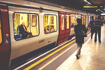 People walking along the platform on the London Underground