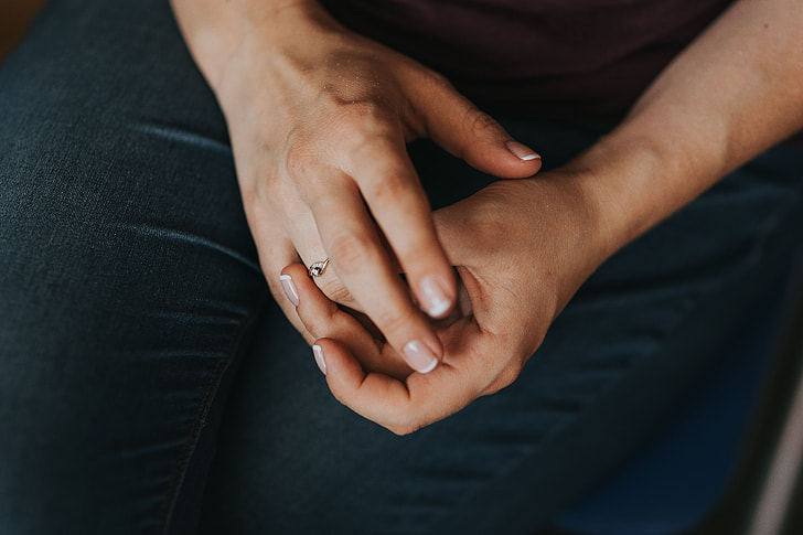 Close-up of woman's hands with a ring