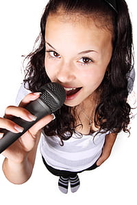 woman holding microphone