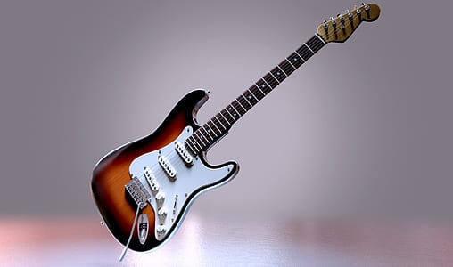 photo of brown stratocaster-style electric guitar