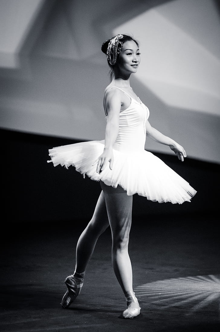 grayscale photo of woman in ballet dress