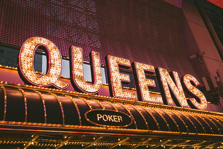 Queens Poker LED signage during nighttime