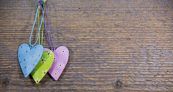 purple, green, and pink heart wall decors