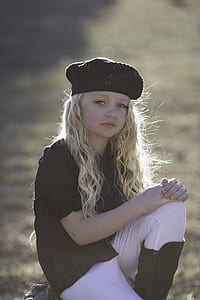 girl wearing hat during daytime