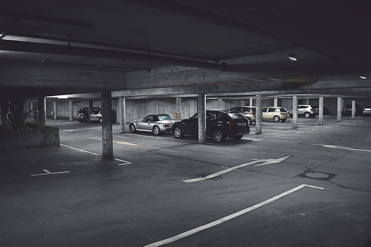 grayscale photography of parked cars