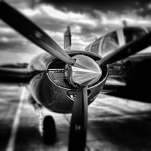 grayscale photo of airplane propeller
