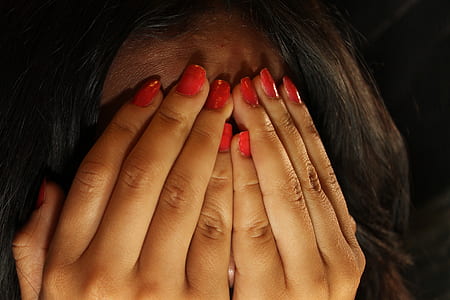 fingernails with red nail polish