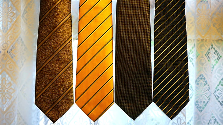 four assorted-color neckties
