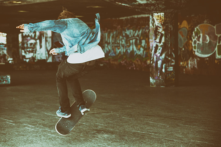 A skateboarder makes a jump at the Southbank by the River Thames in London, England