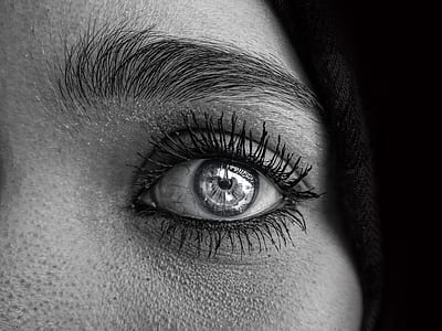 close-up photo of woman's left eye