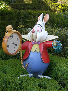 Alice in Wonderland rabbit character statue on garden