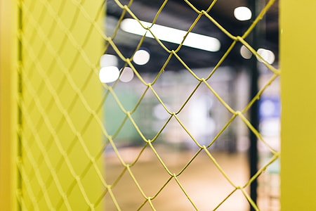 Close-ups of yellow wire netting