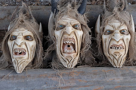 three monster head bust decors