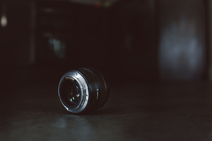 focused close-up photo of black and gray camera lens