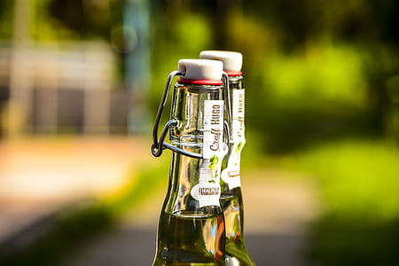 Selective Focus Photography of Two Clear Air Tight Bottles