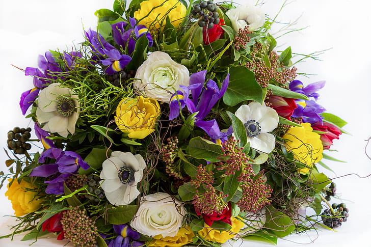 photo of white, yellow, and purple petaled flowers bouquet