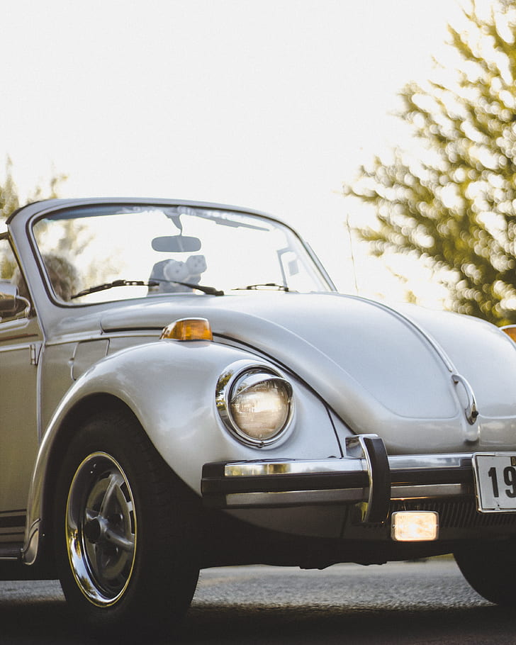 photo of white Volkswagen convertible Beetle