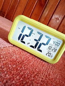 Close-Up Photography of Yellow Alarm Clock