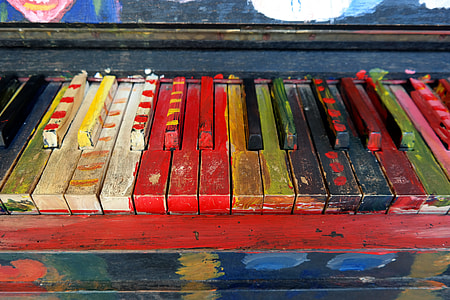 multicolored wooden piano