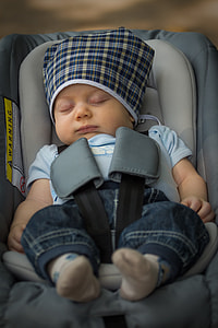 baby sleeping on convertible car seat