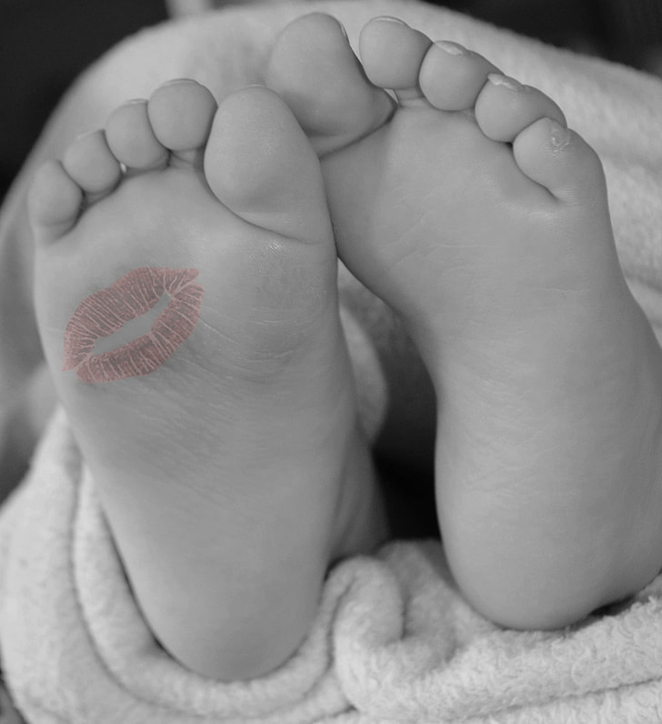 grayscale photo of feet