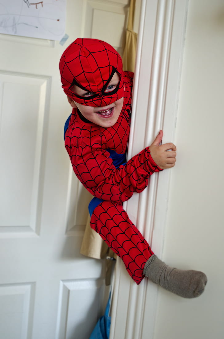 boy wearing Spider-Man costume