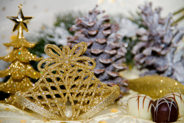 gold-colored tiara near gold Christmas tree