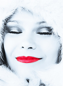 woman wearing fur coat and red lipstick