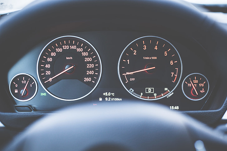 Modern Car Dashboard with Speedometer and Tachometer