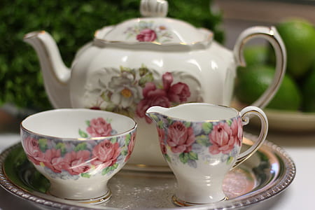 white-and-multicolored floral ceramic tea set of 3