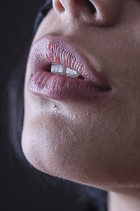 close up image of person's lips