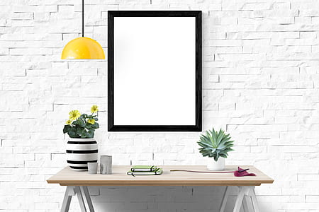 black wooden framed wall decor with table