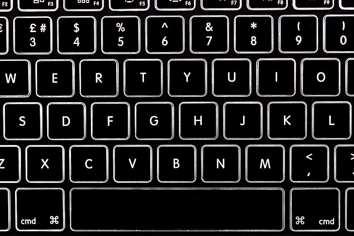 Overhead shot of the backlit keyboard of a laptop computer