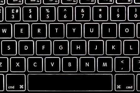 Overhead shot of the backlit keyboard of a laptop computer