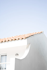beige roof brick house
