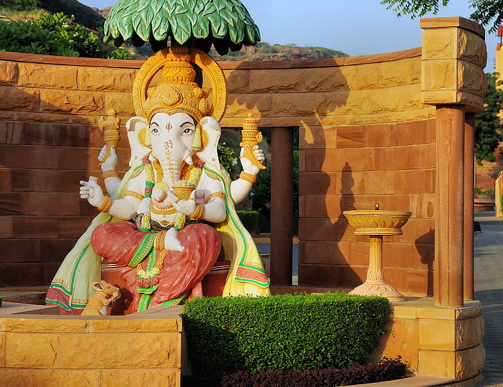 white and green Ganesha statue during daytime