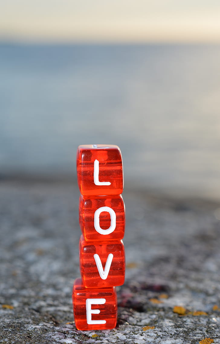 close up photography stackable Love dice decor
