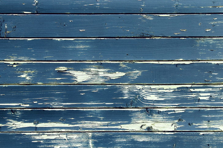 closeup photography of blue and white wooden pallet board