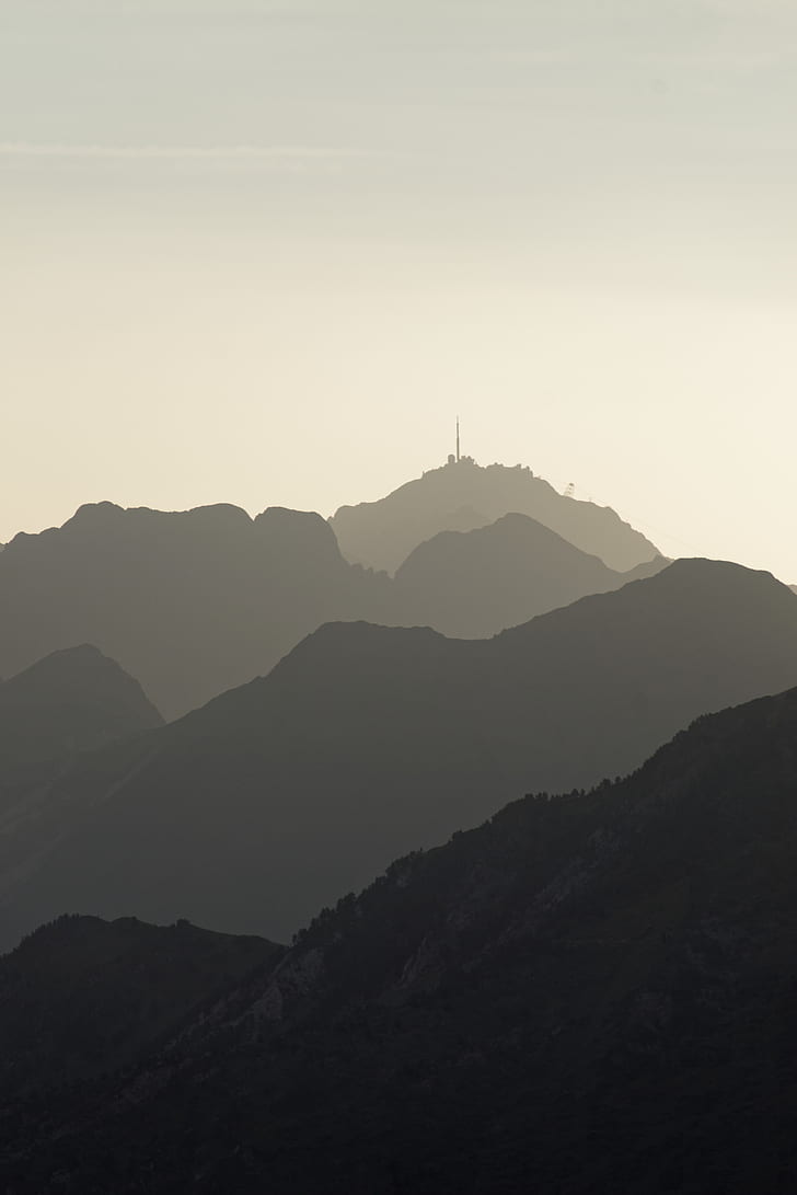 silhouette of mountains during daytime photography